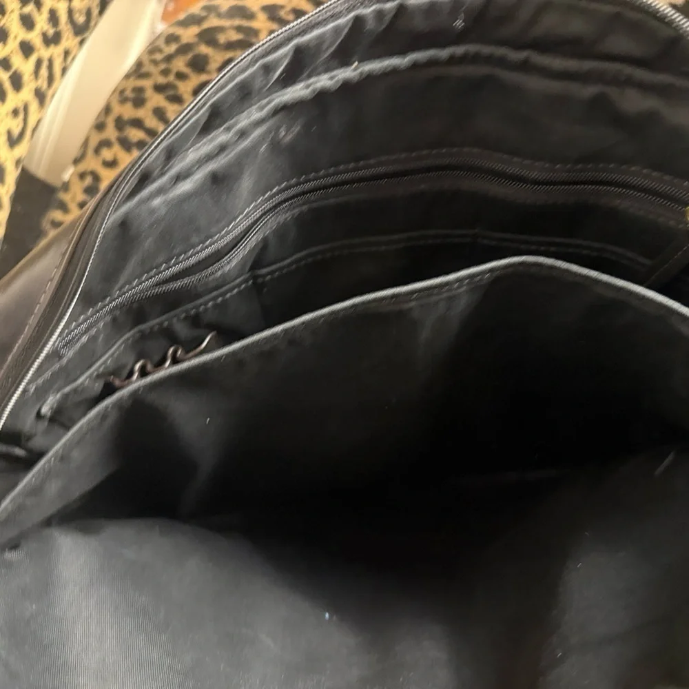 Fossil Leather Black and Gold Briefcase with Elegant Design